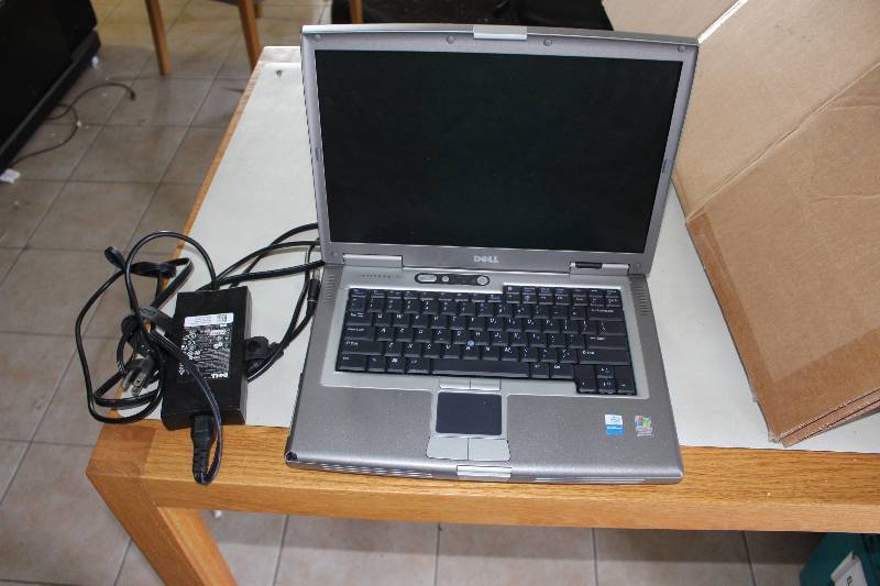 lot 17 image: Dell laptop with ac adapter, as is for parts