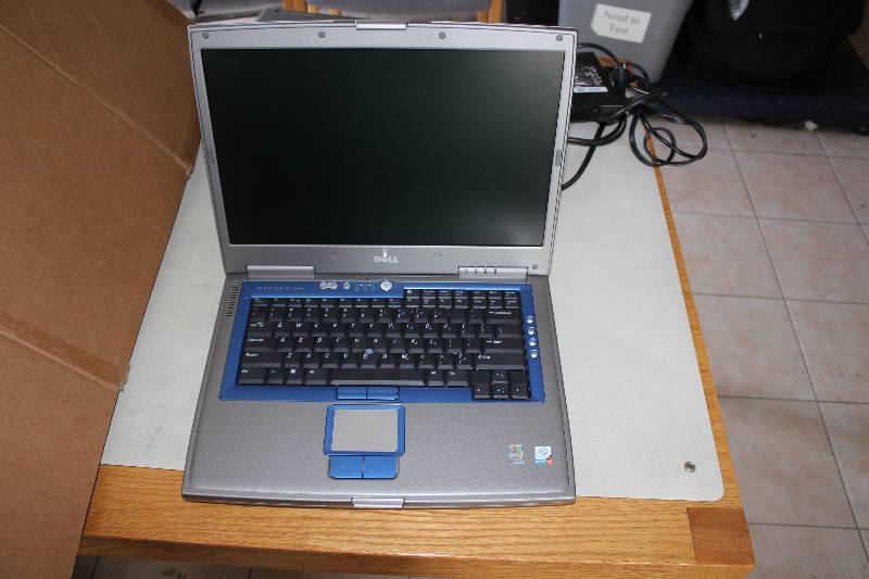 lot 28 image: Dell laptop, as is for parts