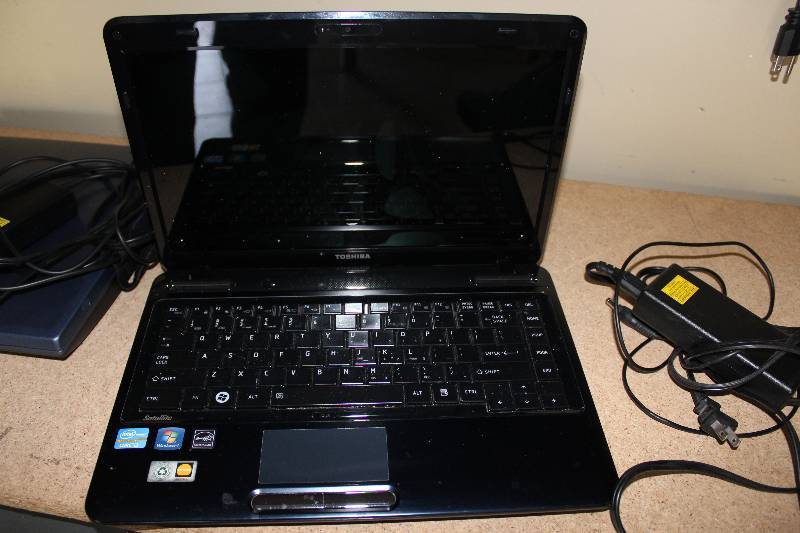 lot 23 image: toshiba laptop with ac adapter, AS IS for parts