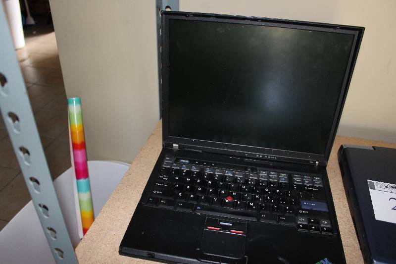 lot 25 image: IBM laptop, as is for parts