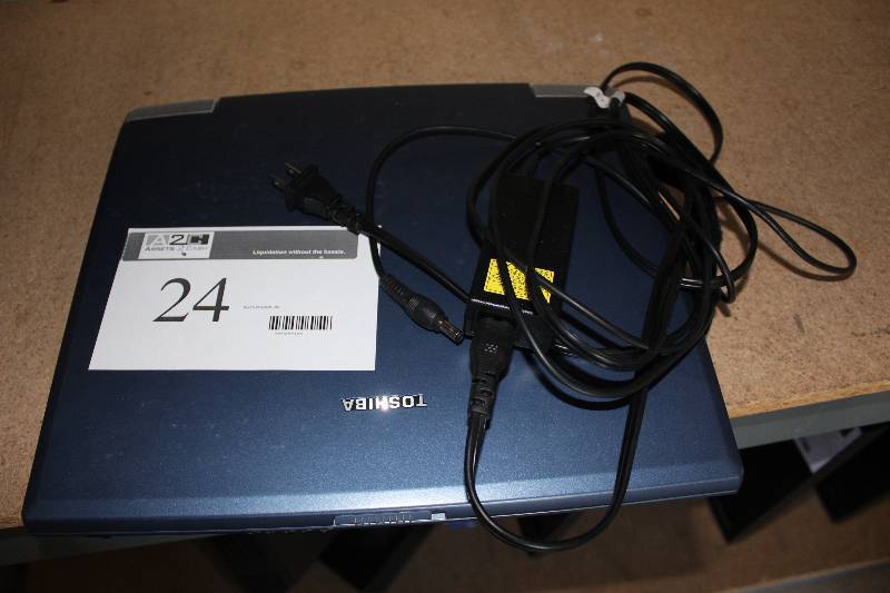 lot 24 image: toshiba laptop with ac adapter, AS IS for parts