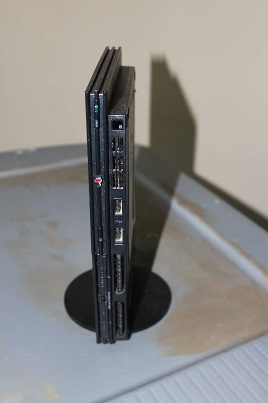 lot 64 image: Playstation 2 as is for parts