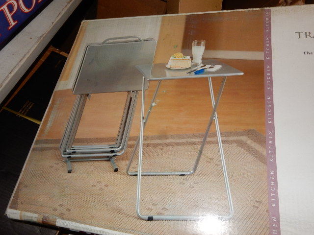 lot 7 image: Metal Tray Table Set.. 4 Metal With Silver Finish tables and stand