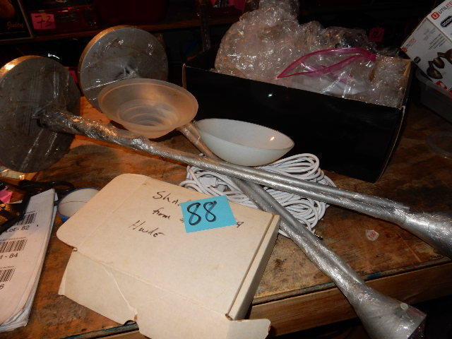 lot 88 image: IKEA, 2 pole lamps with upright glass shades as shown.. Extra hardware included..
