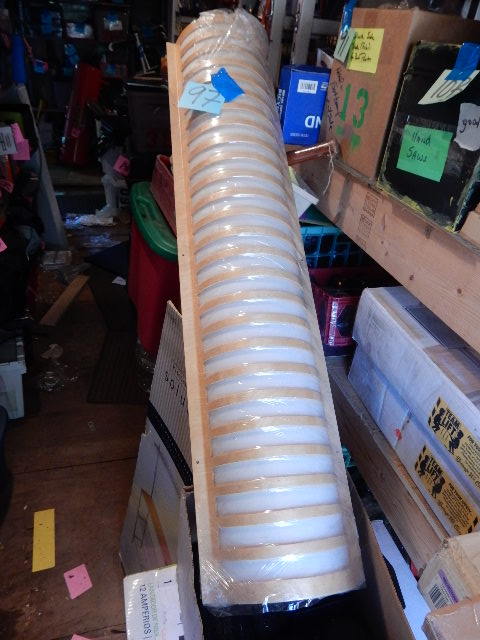 lot 97 image: Fluorescent light fixture covers.. Wood and white plastic.  10 12 in w x 46 12 in long