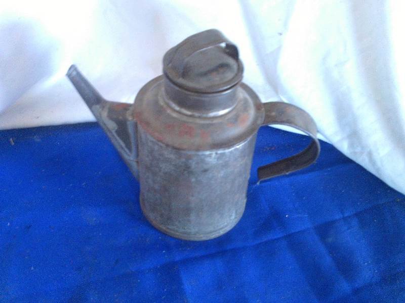 lot 166 image: antique oil spout can