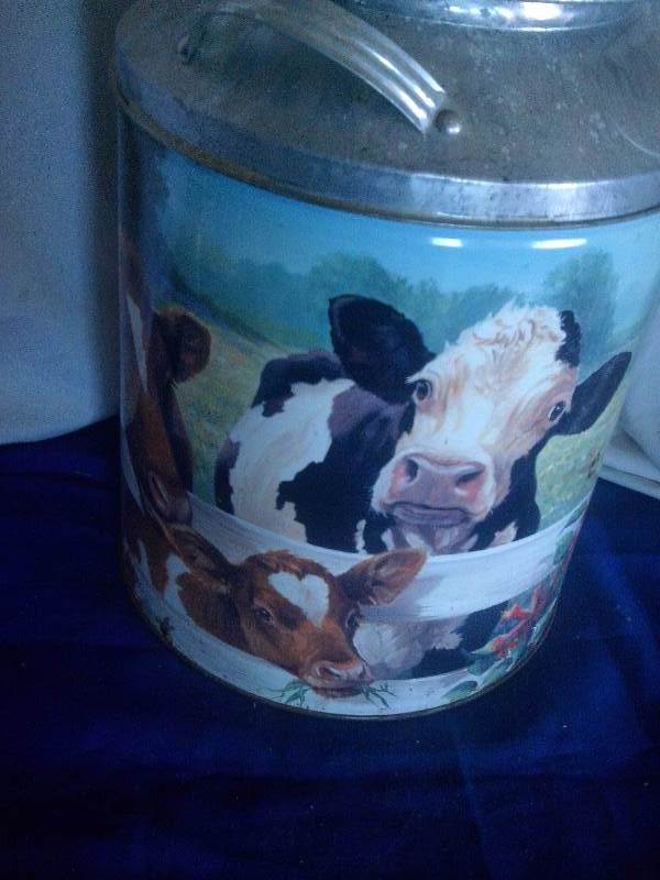 lot 227 image: vintage cow tin