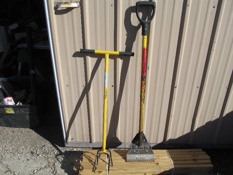 lot 60 image: Shingle rake,along with a earth digger