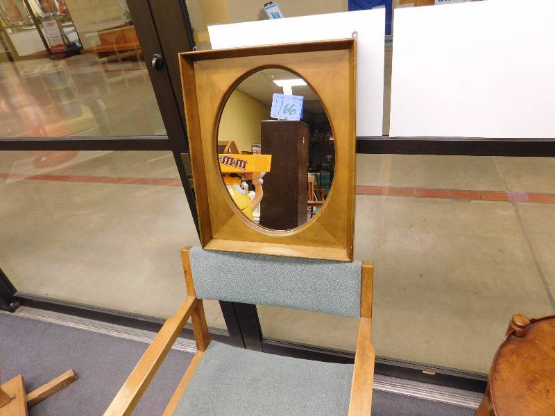 lot 166 image: the Progressive W.H. Gunlocke chair company chair and walnut framed mirror