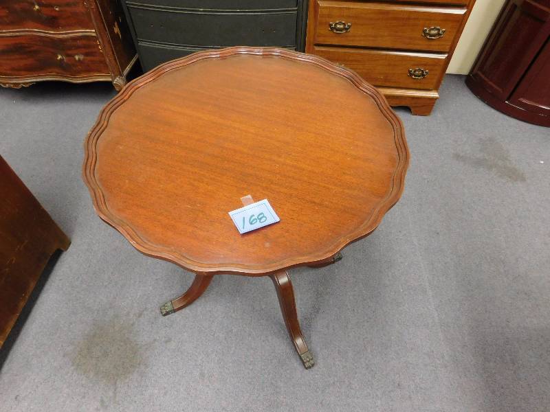 lot 168 image: Vintage lyre harp pie-crust parlor table mahogany metal tip feet