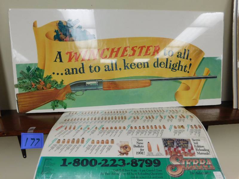 lot 177 image: Vintage Winchester Christmas sign, Sierra mat bullet images chart