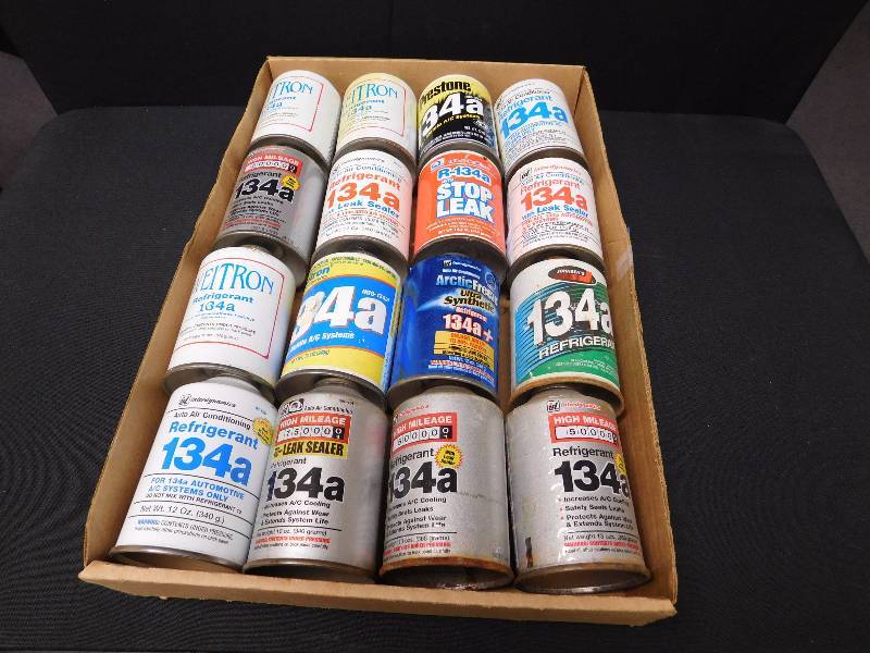 lot 221 image: 16 cans of Freon 134a
