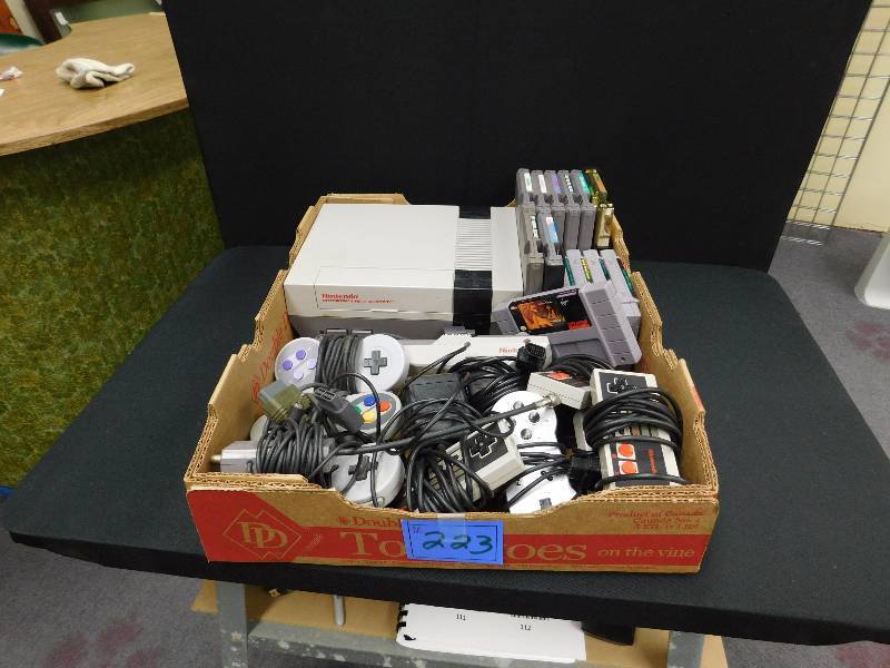 lot 223 image: NES System with adapter and power supply 8 NES games 5 Super Nintendo games