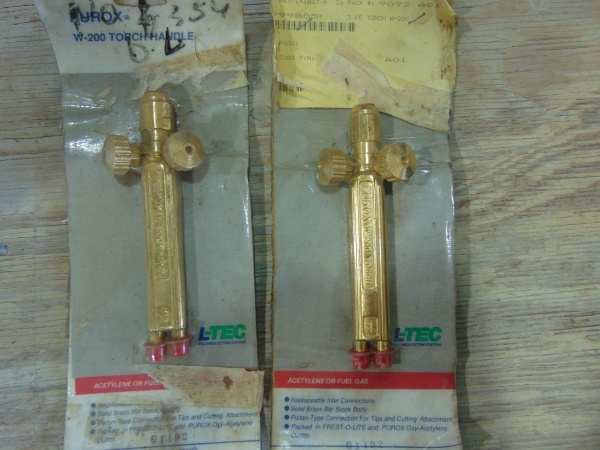 lot 65 image: (2) Torch Handles