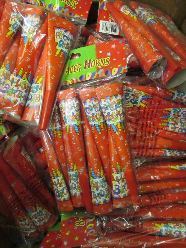 over 100 noise maker horns...