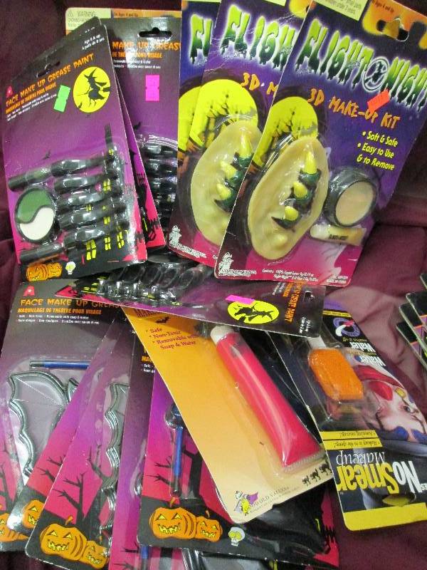 large assortment of halloween makeu...