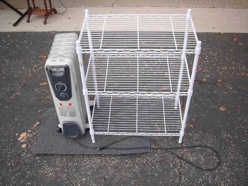 lot 45 image: Electric Heater, Wire Shelf, Small Rug