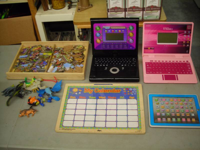 lot 47 image: Box Lot Of Kids Electronic Games, Puzzle, Figures