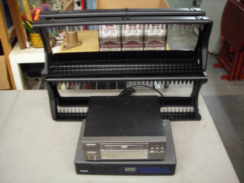 lot 52 image: Pair Of DVD Racks, RCA Under-Cabinet CD, Fisher DVD Player