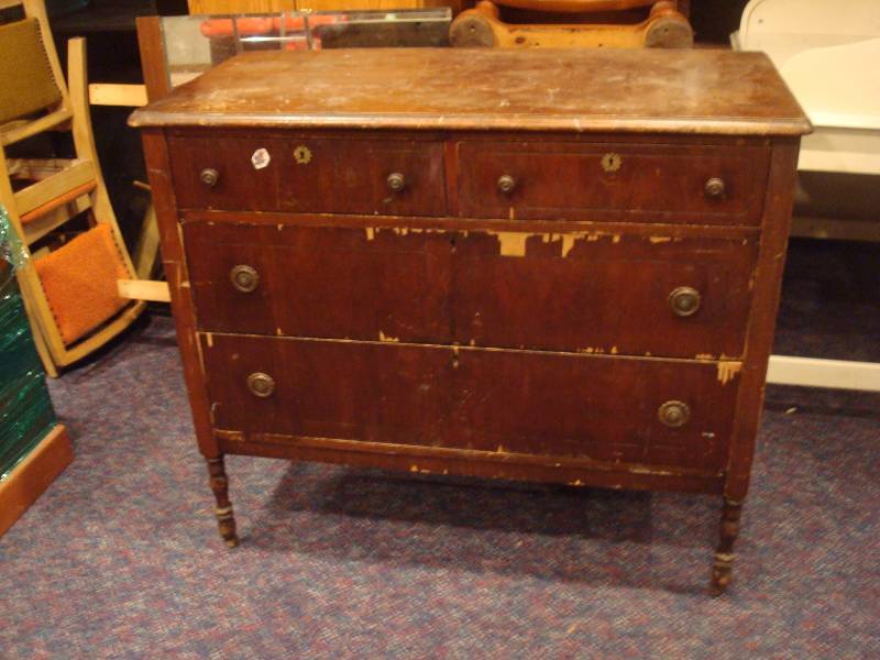 lot 7 image: Vintage Wood Dresser On Caster Wheels. Has We...