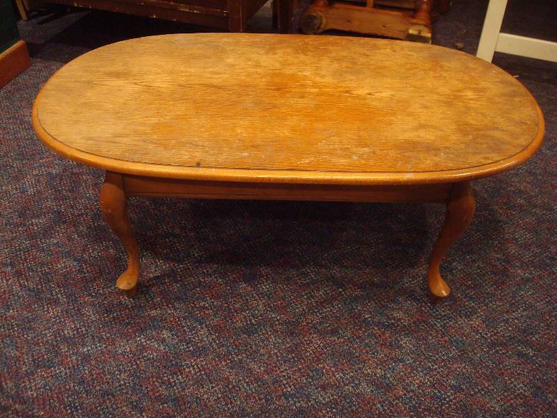 lot 11 image: Wood Coffee Table. Has Wear....