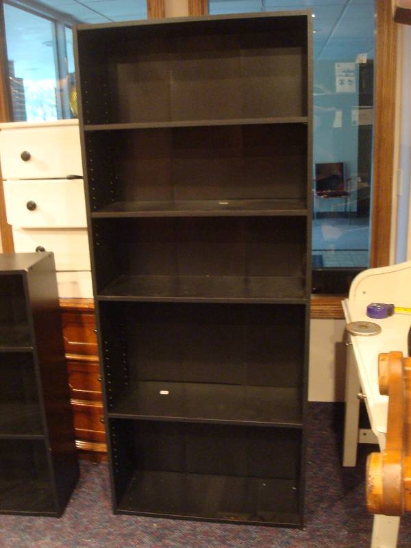lot 19 image: Tall Book Shelf. Some Wear....