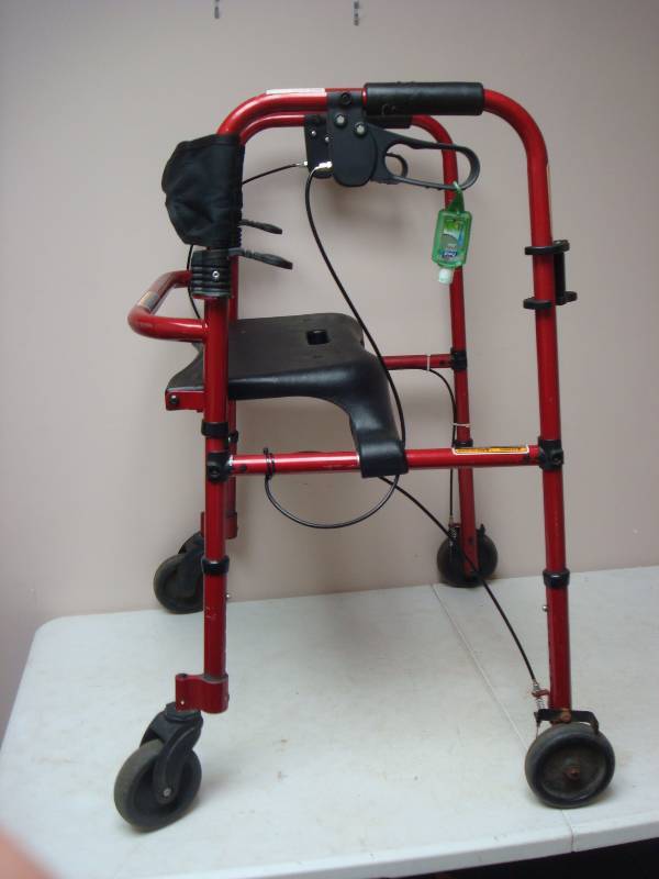lot 28 image: Sit Down Walker With Breaks, Shows Wear, May ...