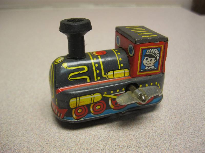 lot 52 image: Vintage Train Engine Tin Toy...