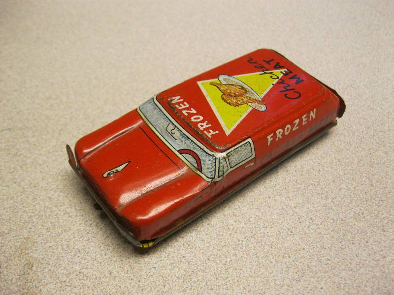 lot 64 image: Vintage Frozen Chicken Meat Tin Car....