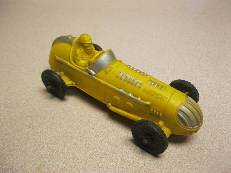 lot 65 image: Vintage Auburn Rubber Race Car....