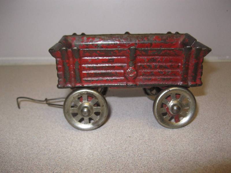 lot 73 image: AntiqueVintage Cast Iron Toy Wagon...