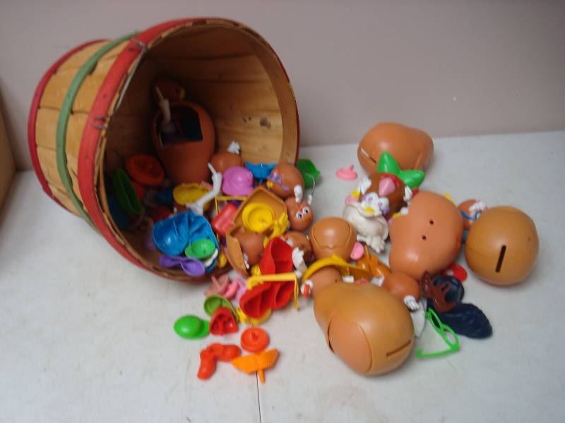 lot 87 image: Basket Of Potato Heads And Parts....