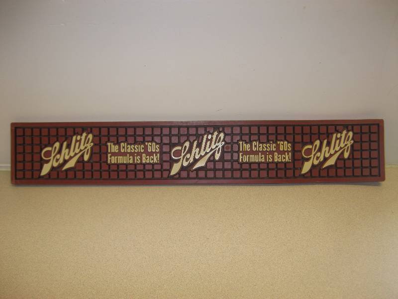 lot 92 image: Vintage Schlitz&nbspRubber&nbspBar Bumper....