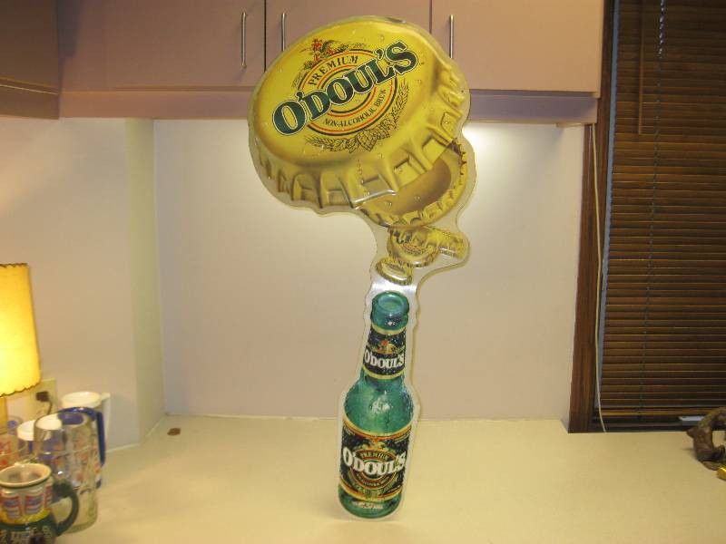 lot 98 image: Large ODouls&nbspTin Sign....