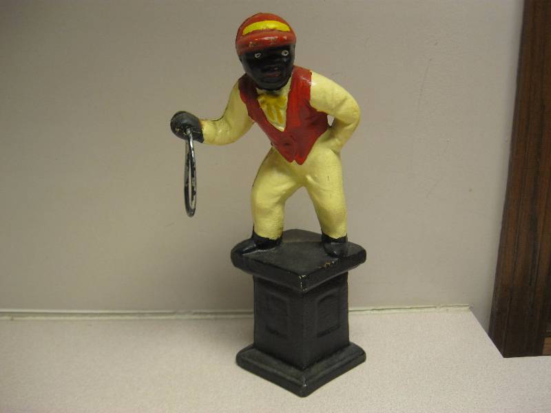 lot 112 image: Reproduction Lawn Jockey Cast Iron Statue...