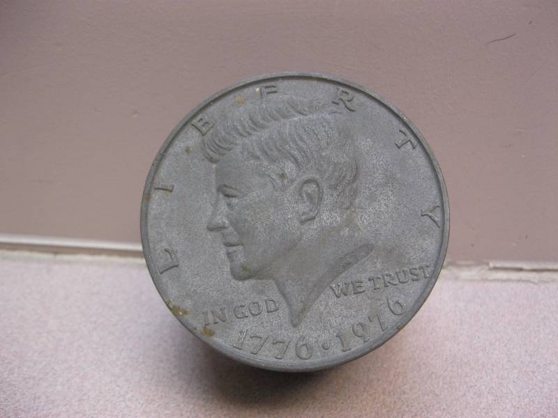 lot 134 image: Vintage Metal Kennedy Bank 1976....