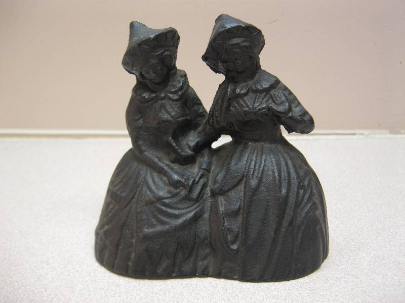lot 228 image: Cast Iron Twin Girl Bell....
