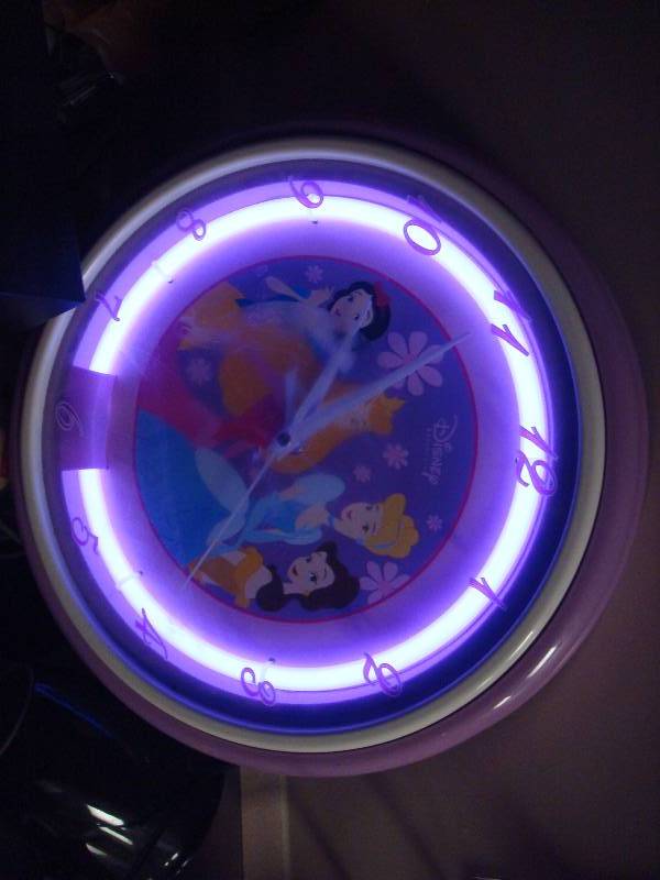 lot 244 image: Neon Disney Princess Clock. Wear To Face Cove...