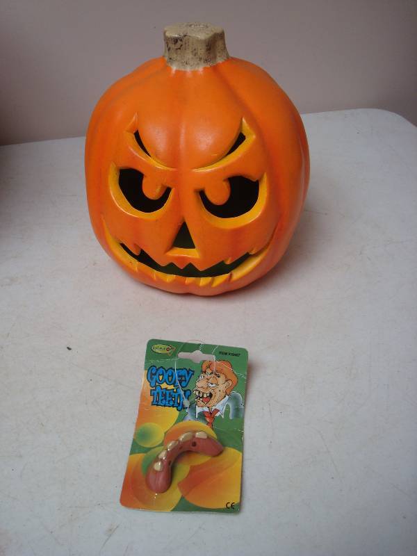 lot 255 image: Goofy Teeth Foam Pumpkin....