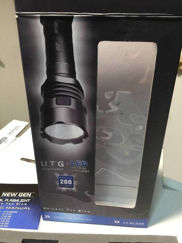 lot 32 image: UTG LED Tactical Flashlight
