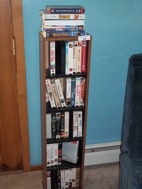lot 36 image: VHS shelf with VHS Movies