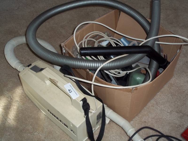 lot 43 image: Oreck XL Vacuum with attachments