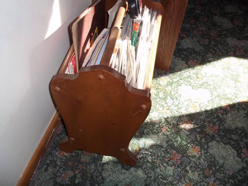 lot 56 image: Magazine rack with magazines