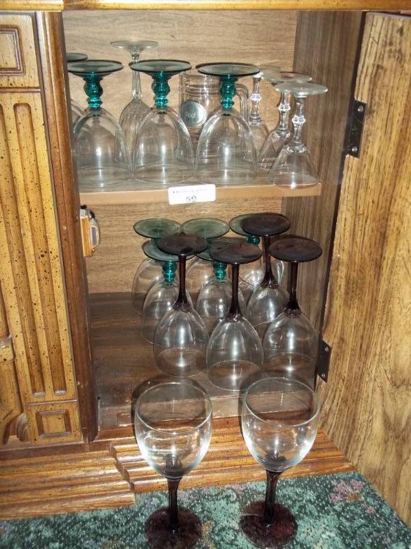 lot 59 image: Shelves with wine glasses