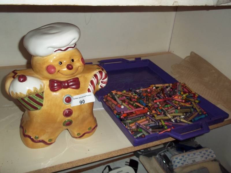 lot 90 image: Cookie jar with crayons