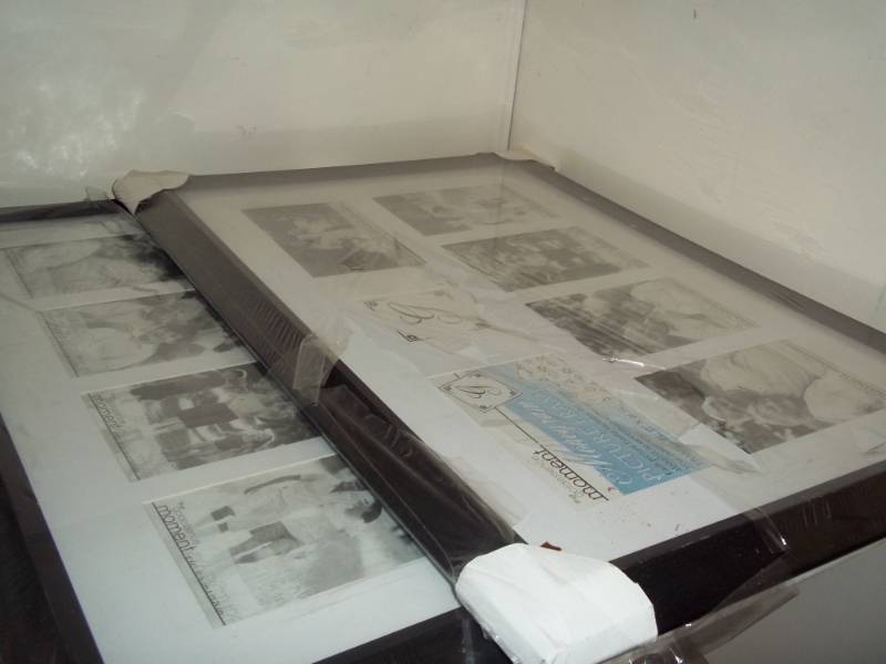 lot 91 image: 2 picture frames with books