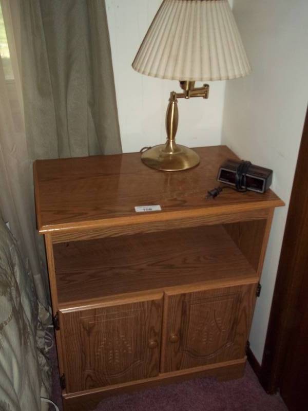 lot 108 image: Night stand with lamp and alarm clock