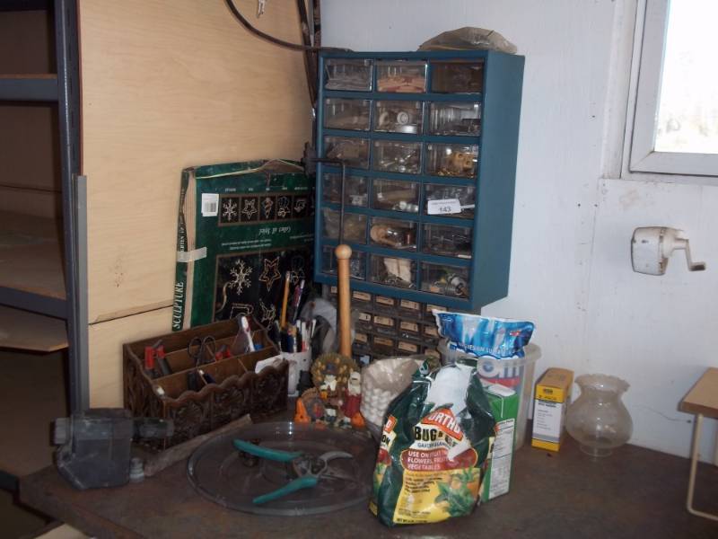 lot 143 image: Lot of items includes wall organizer with pruners and garden items
