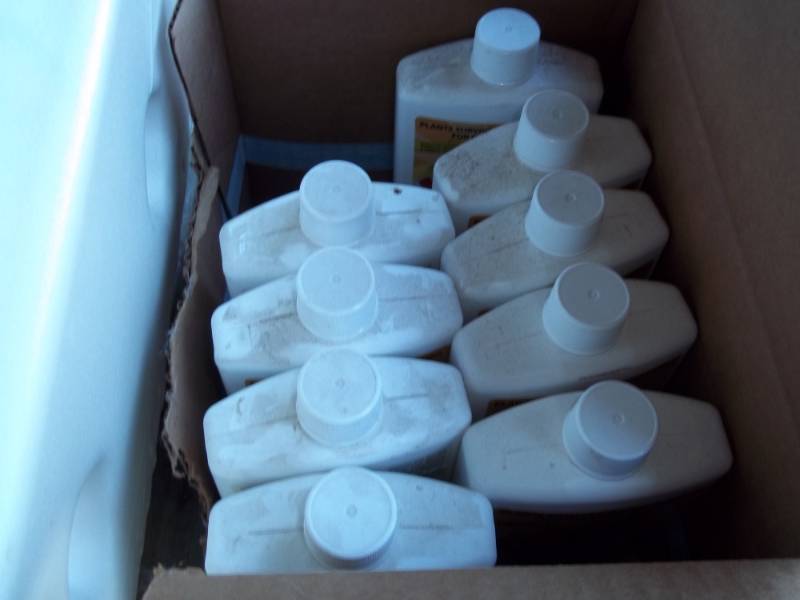lot 270 image: Lot of 9 bottles of Vacation Plant Treatment