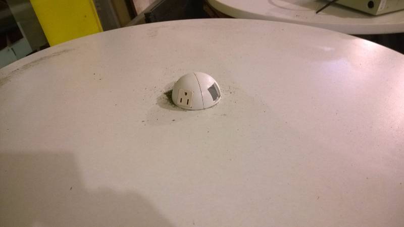 lot 4 image: White table with electricity outlet